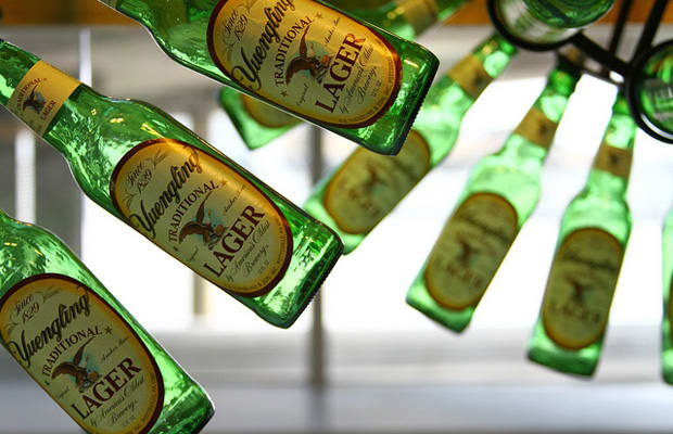 Multiple green colored beer bottles