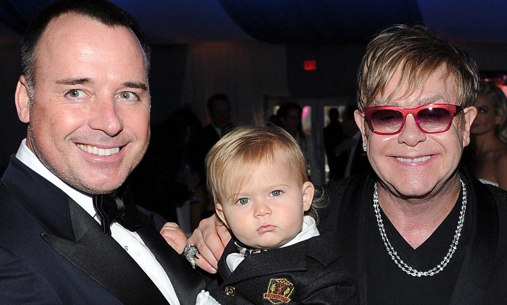 BEVERLY HILLS, CA - FEBRUARY 26: David Furnish, son Zachary and Sir Elton John attend the 20th Annual Elton John AIDS Foundation Academy Awards Viewing Party at The City of West Hollywood Park on February 26, 2012 in Beverly Hills, California. (Photo by Larry Busacca/Getty Images for EJAF) ***BESTPIX***