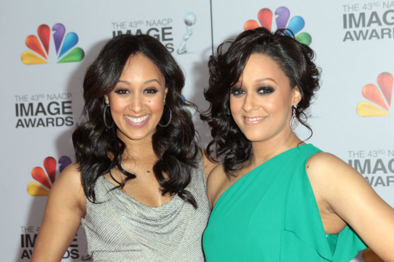 LOS ANGELES, CA - FEBRUARY 17: Actresses Tamera Mowry-Housley (L) and Tia Mowry arrive at the 43rd NAACP Image Awards held at The Shrine Auditorium on February 17, 2012 in Los Angeles, California. (Photo by Frederick M. Brown/Getty Images for NAACP Image Awards)