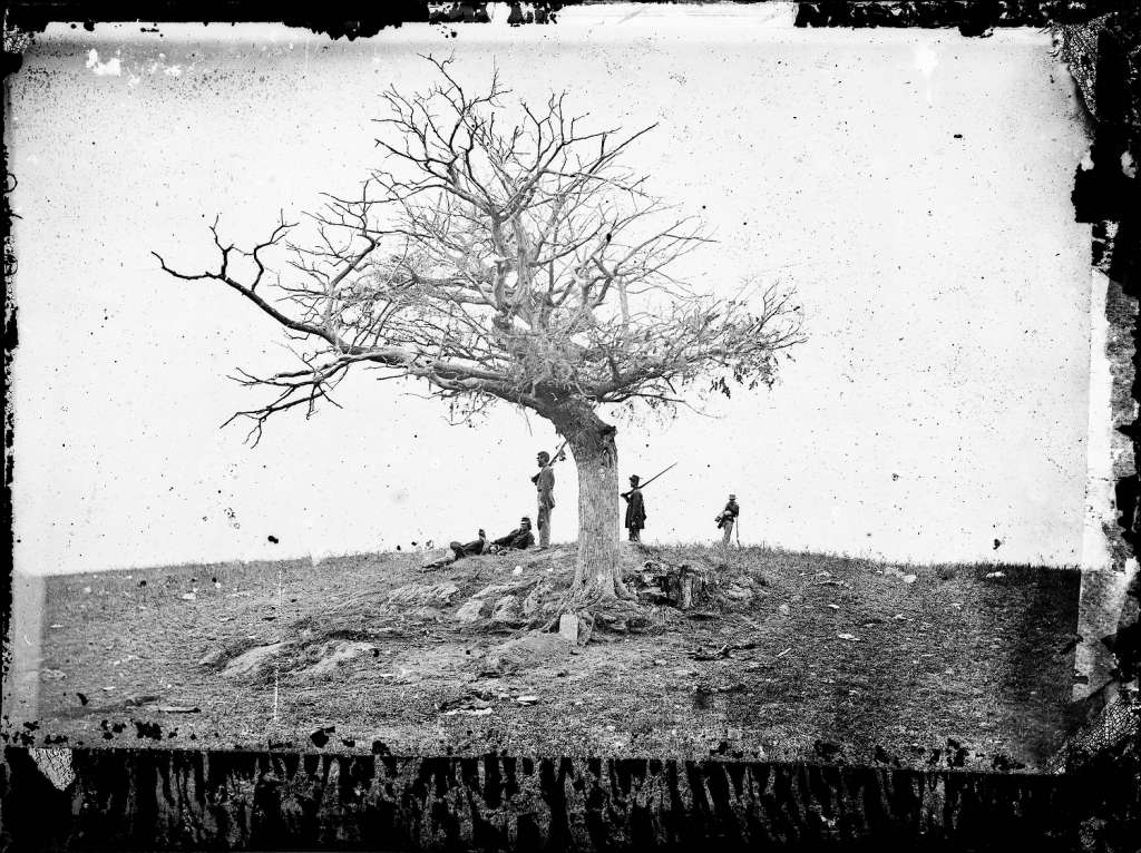 This 1862 photo made available by the Library of Congress shows soldiers next to a lone grave after the Battle of Antietam near Sharpsburg, Md. When dawn broke along Antietam Creek on Sept. 17, 1862, cannon volleys launched a Civil War battle that would leave 23,000 casualties on the single bloodiest day in U.S. history and mark a crucial pivot point in the war. And yet it might never have occurred - if not for what a historian calls a 