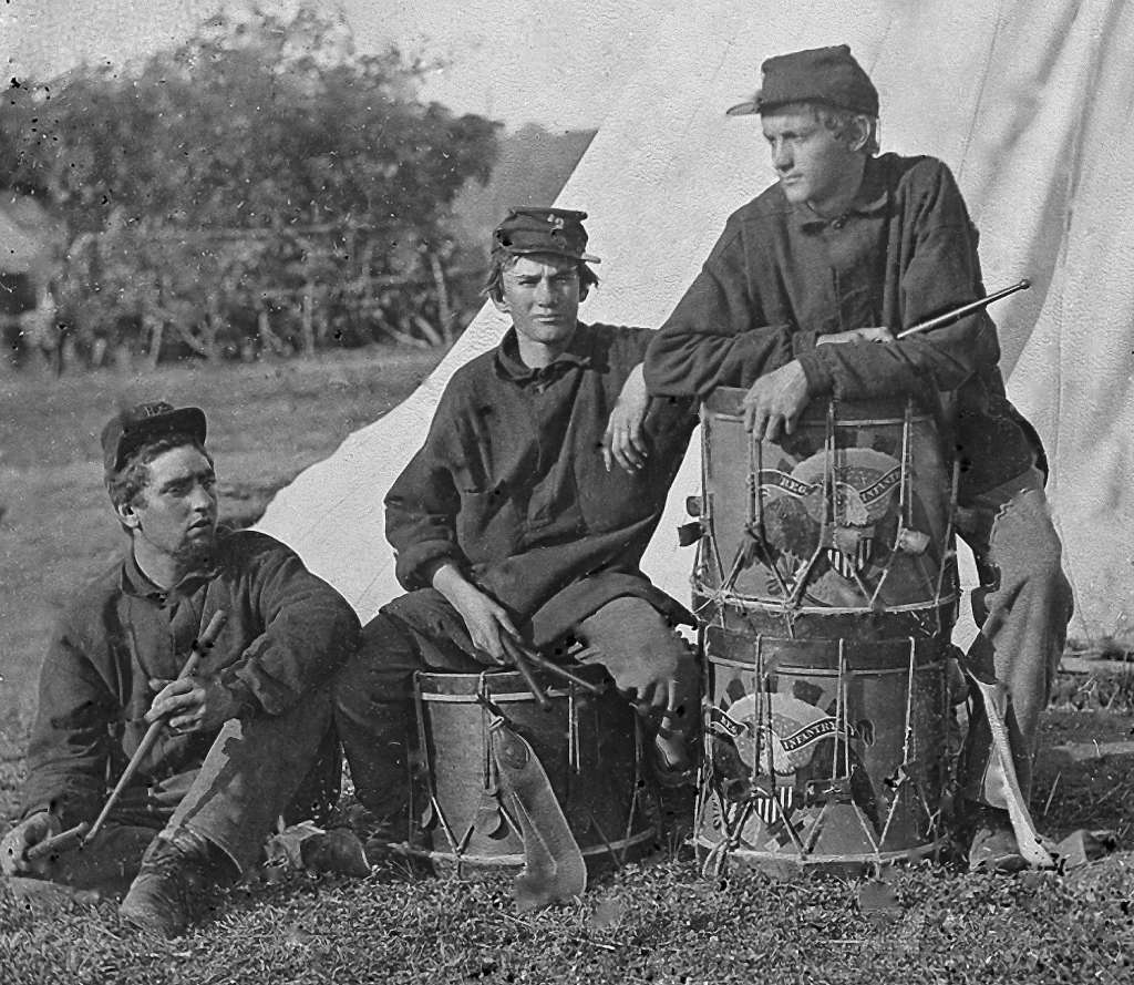 Field Band of the 2nd Rhode Island Infantry; Music played a big part on both sides of the conflict: On the battlefield, different instruments - bugles, drums, and fifes were played to issue marching orders or sometimes simply to boost the morale. Soldiers of both sides often engaged in recreation with musical instruments, and when the opposing armies were near each other, sometimes the bands from both sides of the conflict played against each other on the night before a battle. Photo: Getty Images