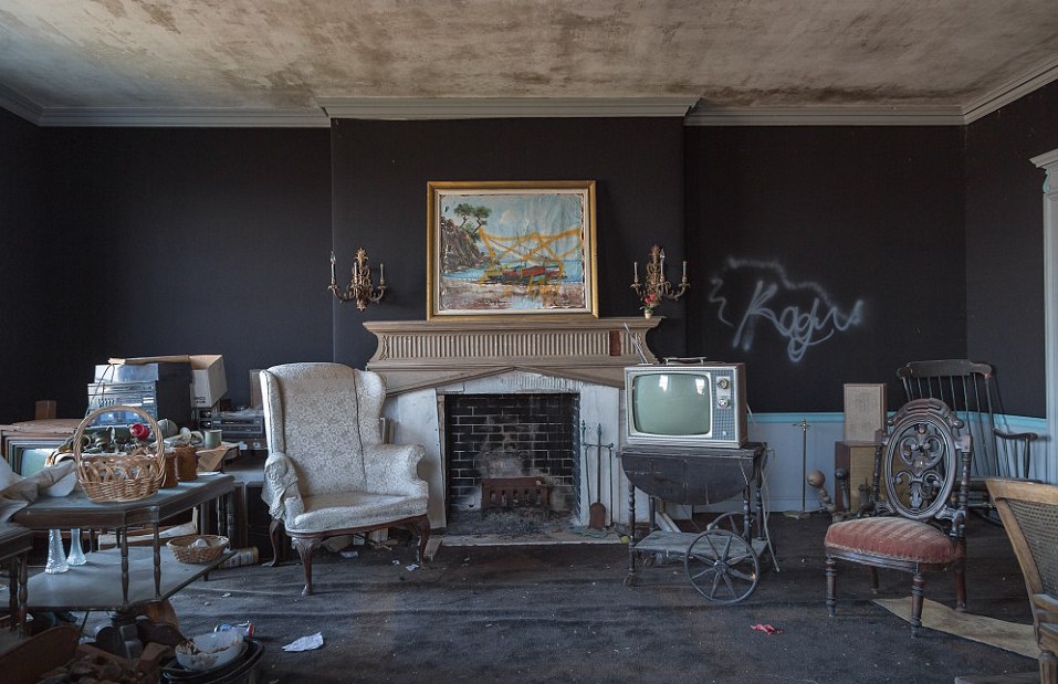 The Fireplace Shows Expensive Paintings And Furniture Left To Decay