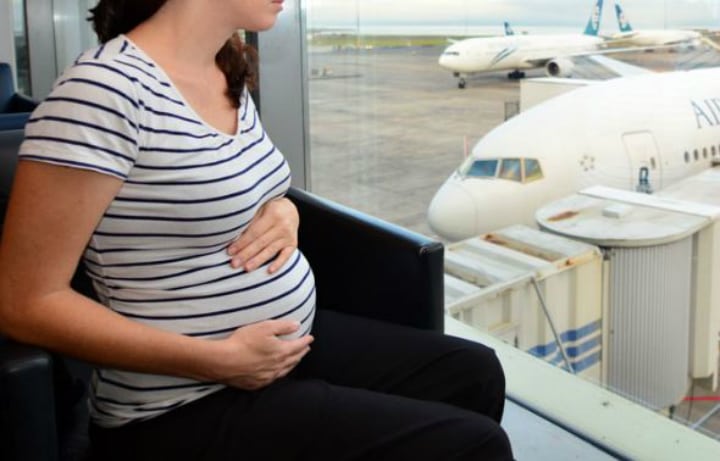 pregnant woman traveling