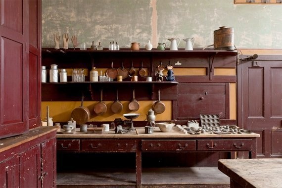 These homeowner's found an entire servants' kitchen in the basement of a property that had been in their family for years: Until now, the door to the space was hidden by old junk.