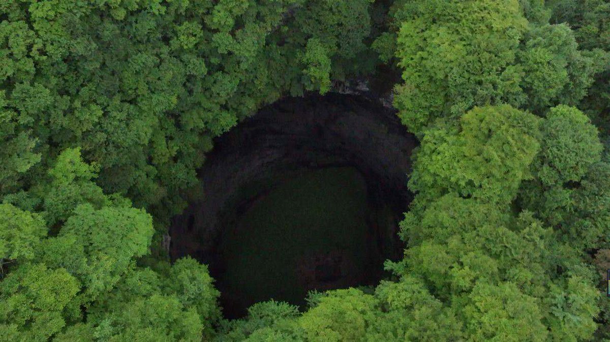 A Team Of Researchers Decide To Explore A Giant Sinkhole In