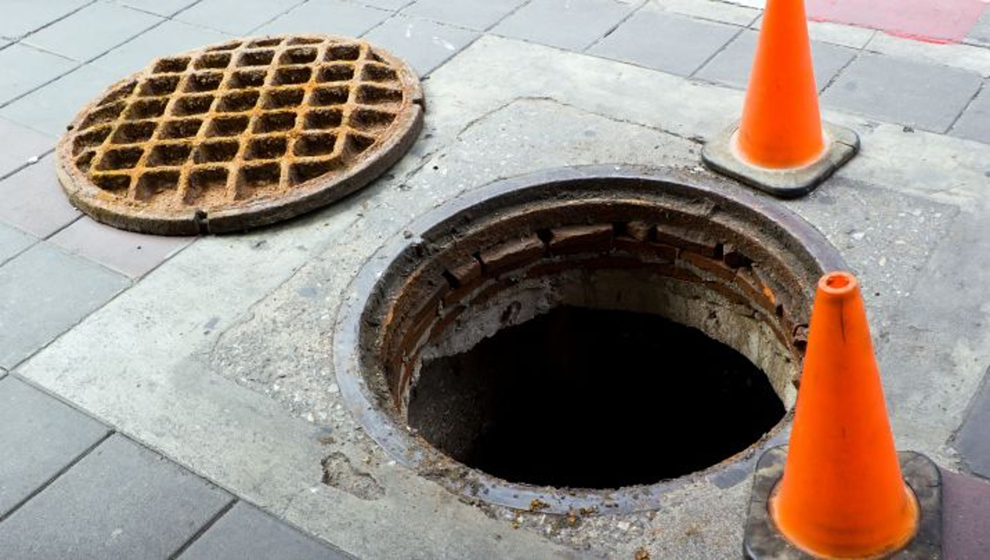 Image result for man working sewer